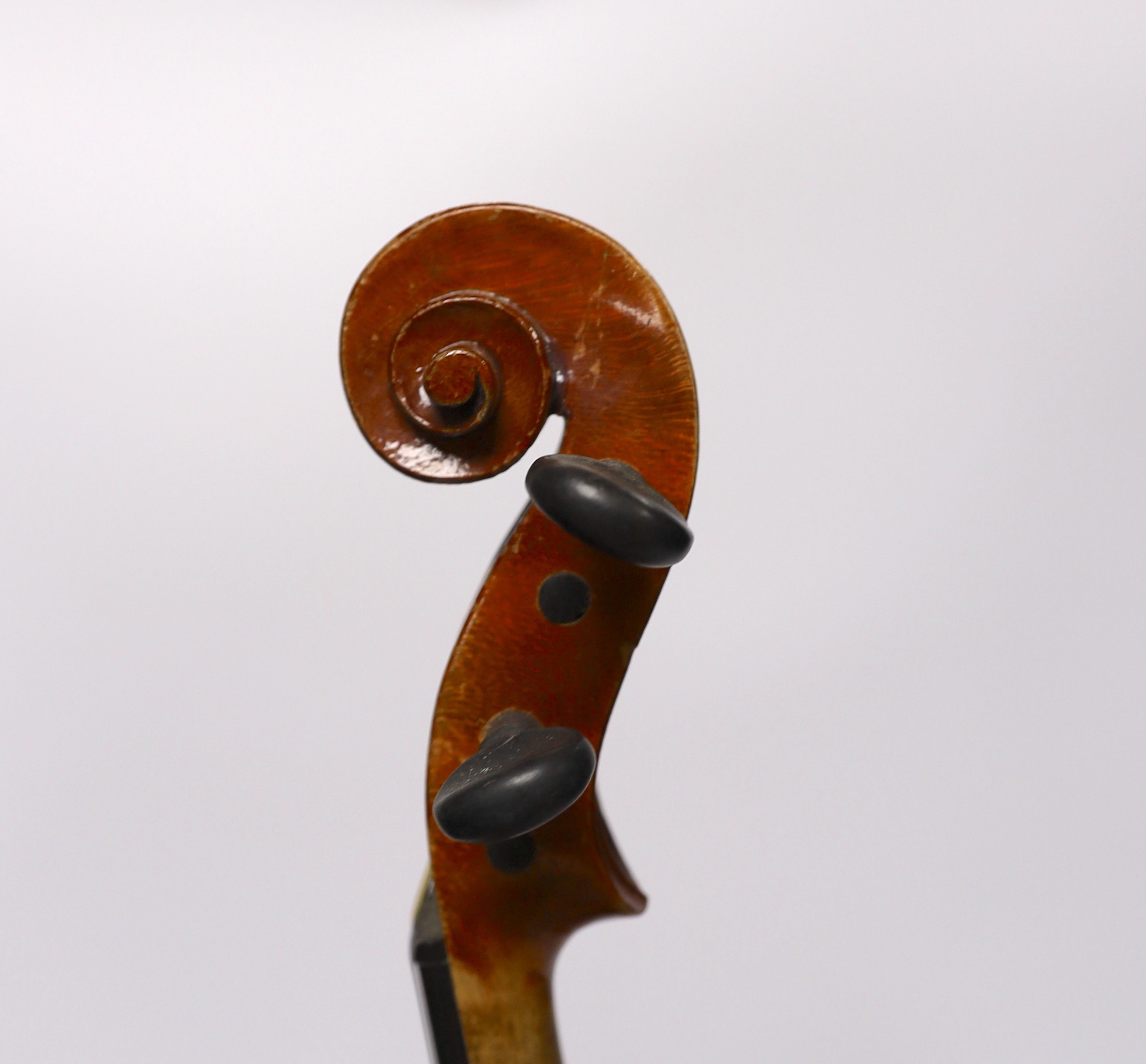 A cased 3/4 sized student violin marked Dresden, with reproduction Stradivarius label